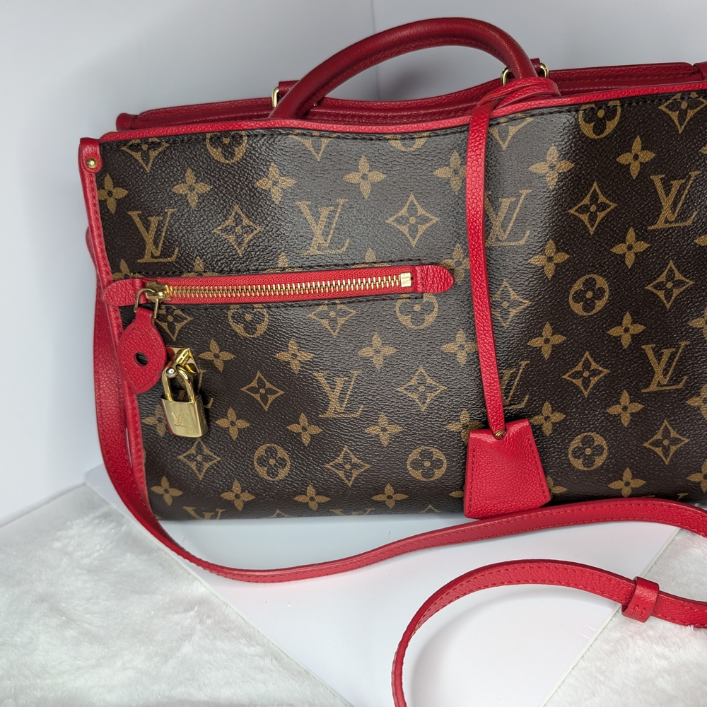 Louis Vuitton Popincourt PM in Monogram canvas with red leather trim